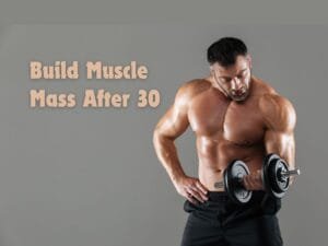 Image of a ripped bodybuilder doing bicep curls: building muscle mass after 30