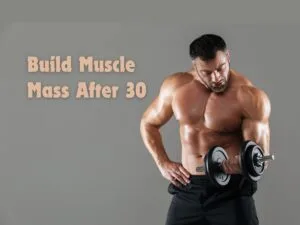 Image of a ripped bodybuilder doing bicep curls: building muscle mass after 30