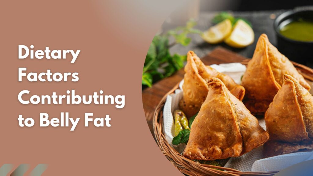 Plate of deep-fried samosas with chutney and lemon slices in the background.