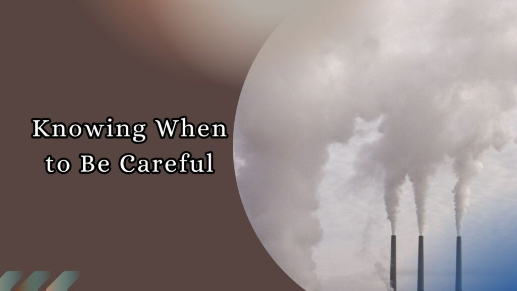 Industrial chimneys releasing smoke into the sky, increasing air pollution.