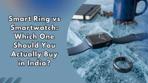 Smart ring and smartwatch placed side by side on an icy surface, illustrating a comparison of the two wearables for buyers in India.